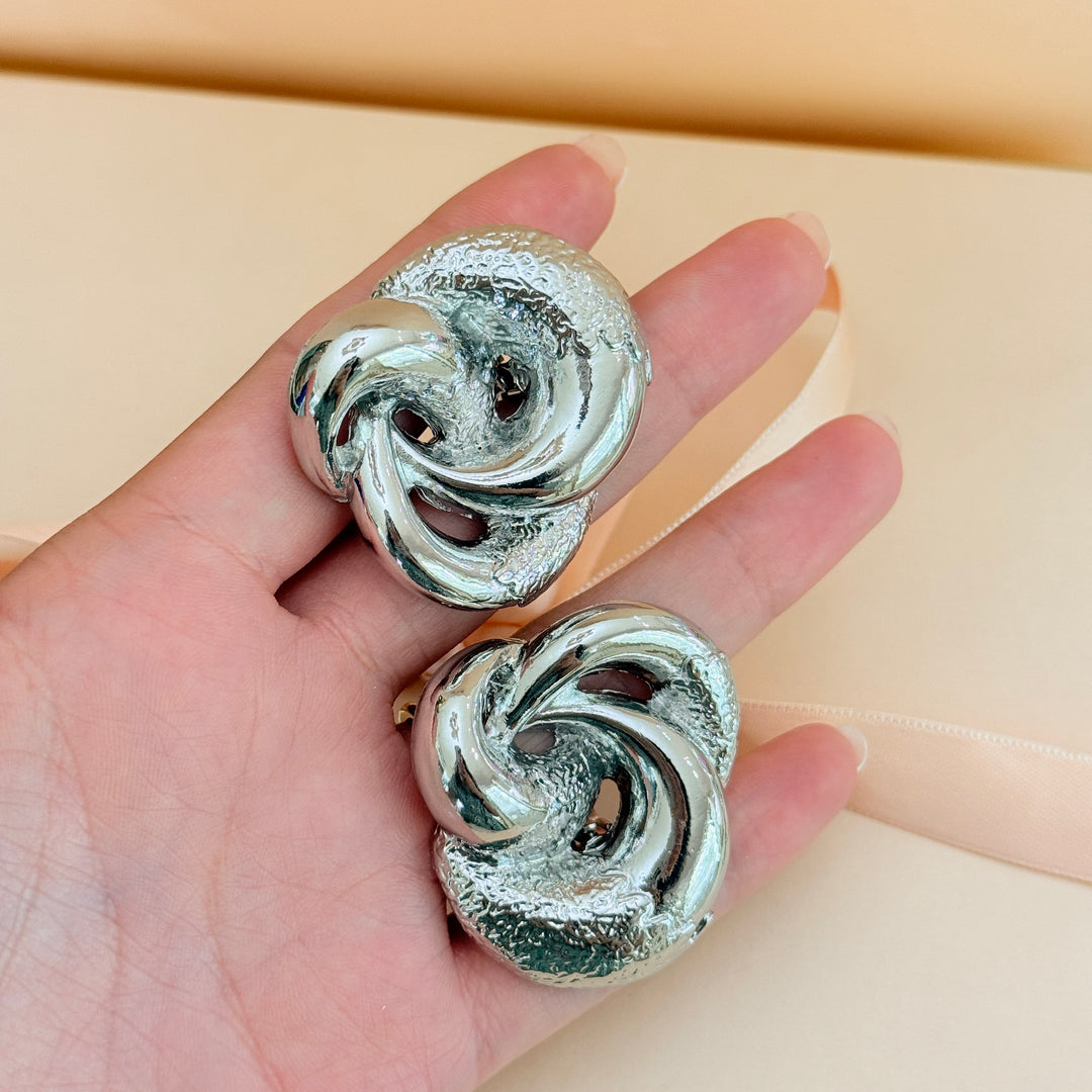 Plain chunky twisted silver clip on earrings