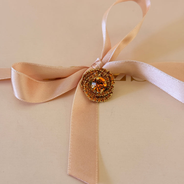 Round Orange preciosa crystals gold plated brooch