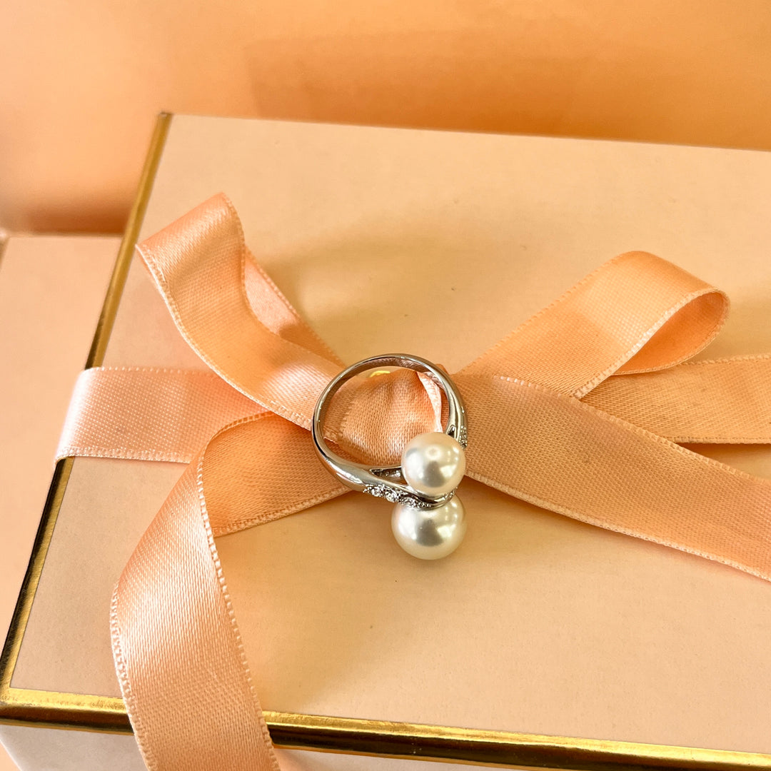 Zircone and double ivory pearls white gold plated ring