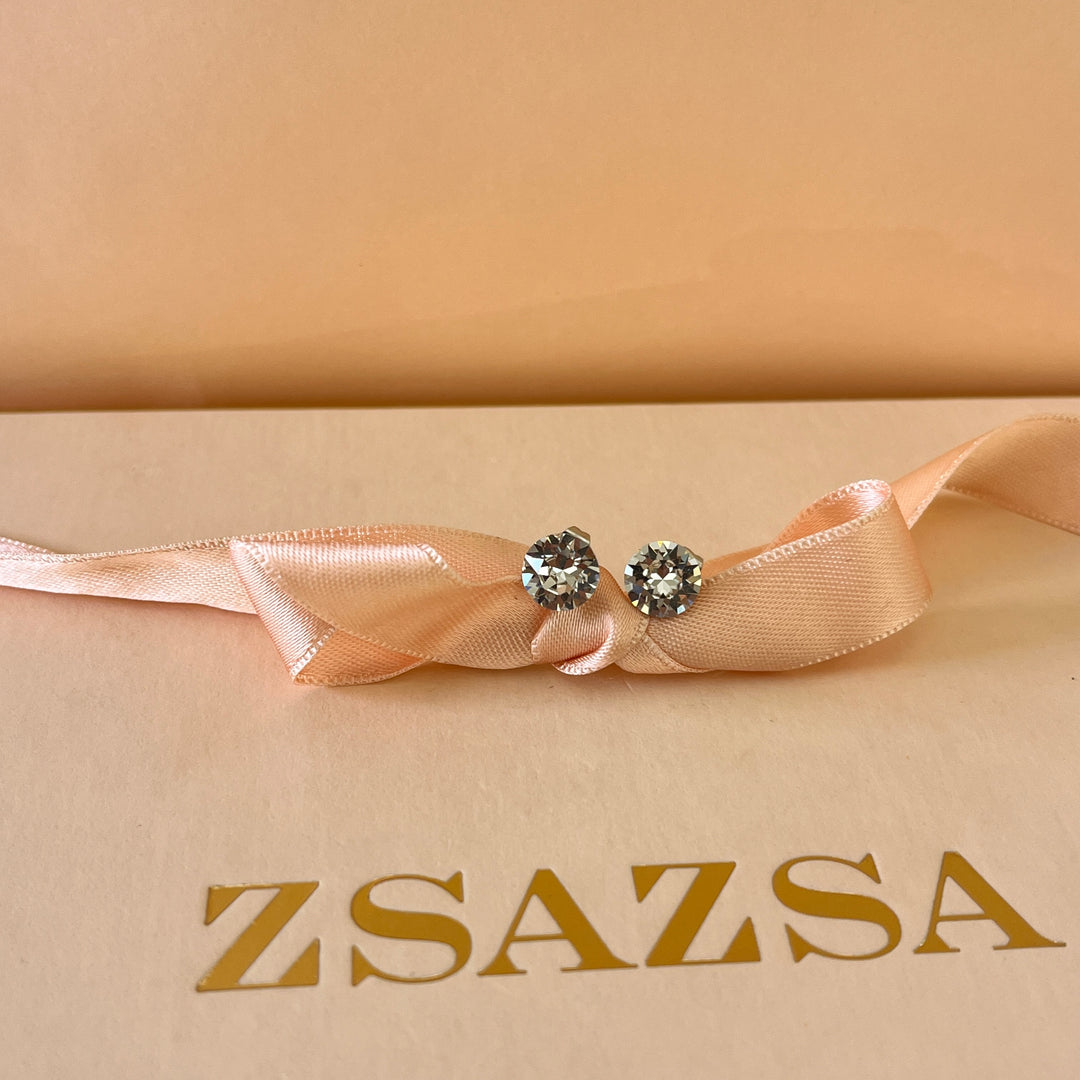 Swarovski crystals medium round white gold plated studs