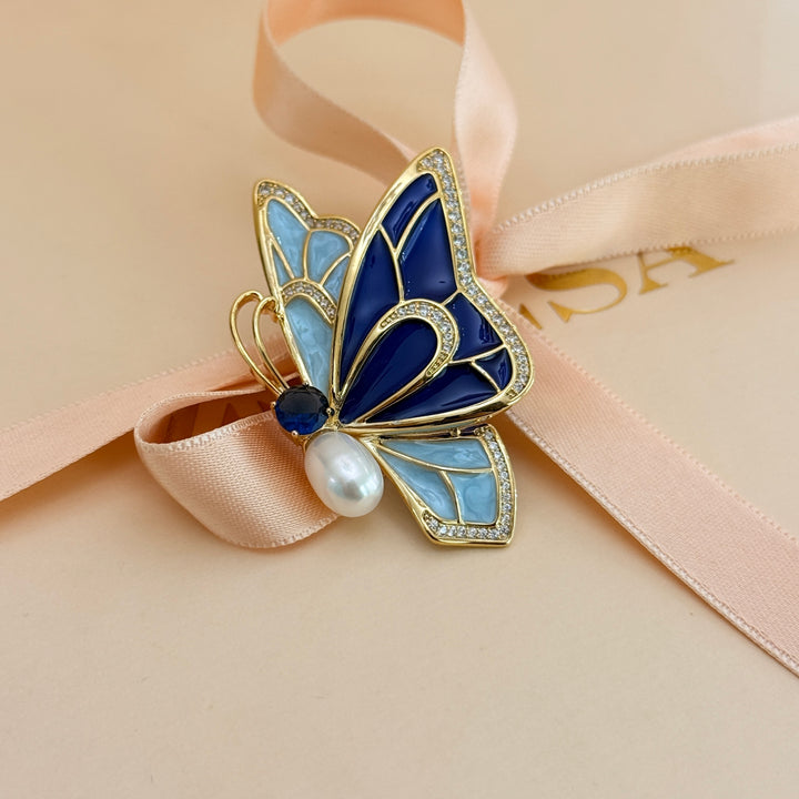 Blue enamel and zircone pearl gold plated brooch