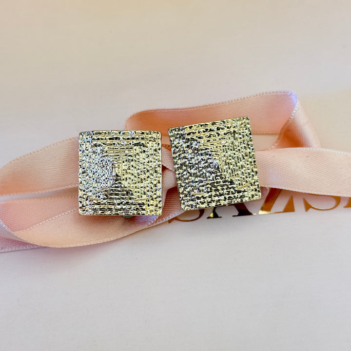 Plain chunky texture squeaker gold plated clip on earrings