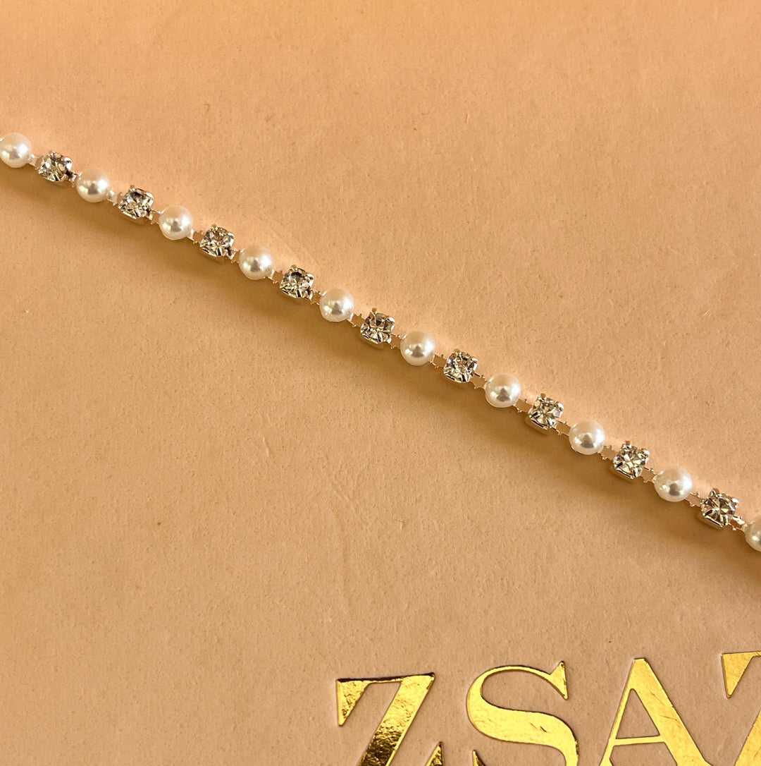 Peal and rhinestone white gold plated bracelet