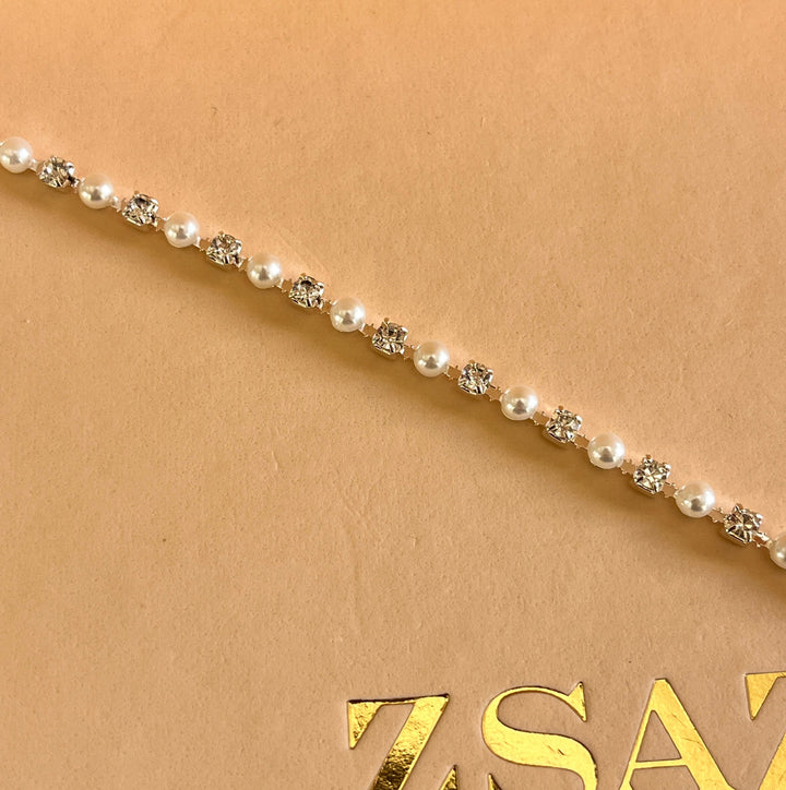 Peal and rhinestone white gold plated bracelet