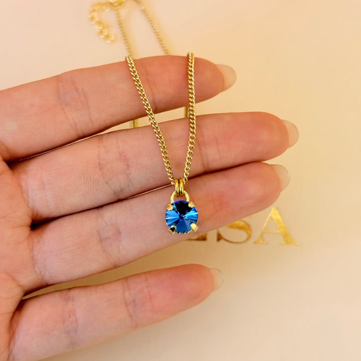 Royal blue gold plated solitaire set