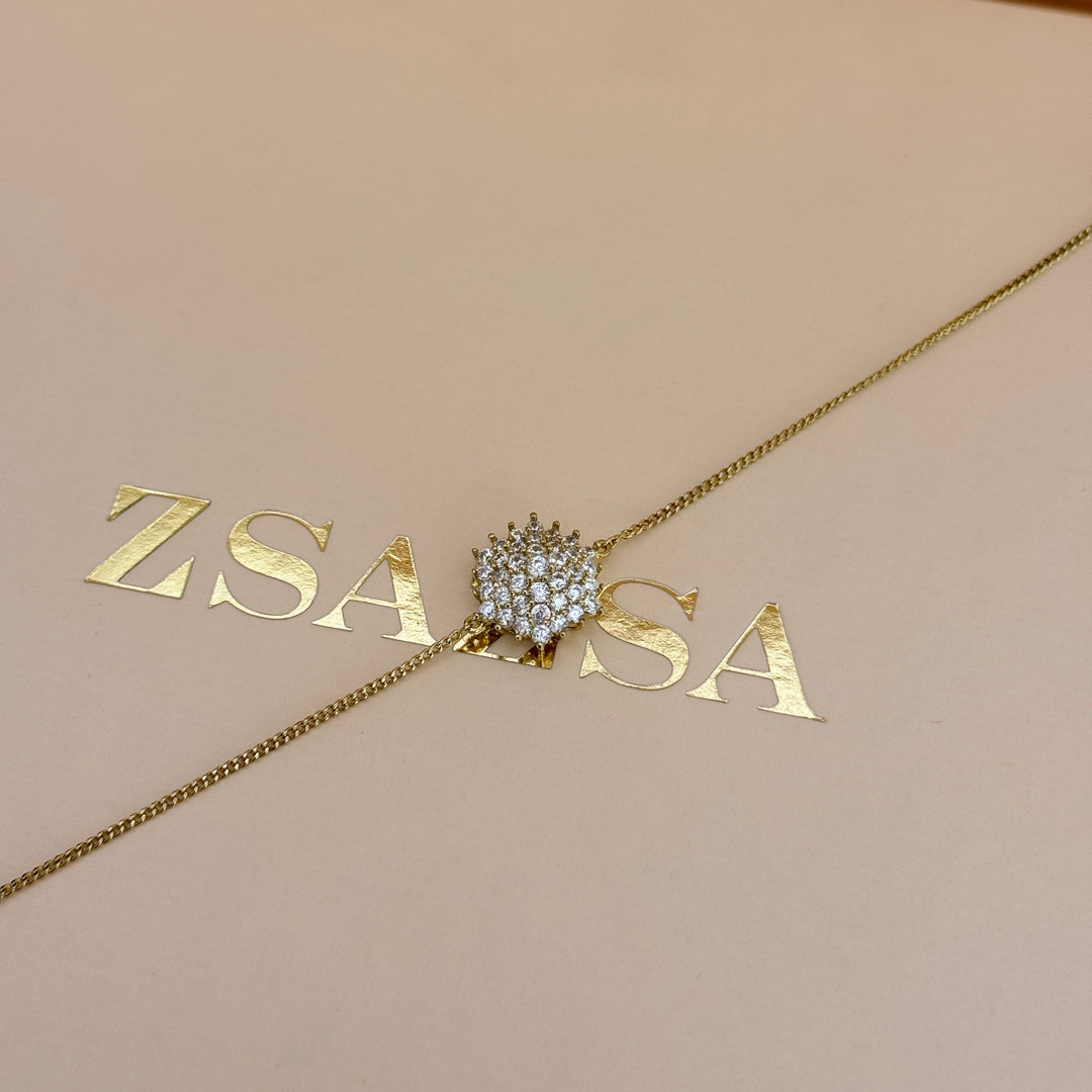 Zircone flower gold plated pendant & bracelet