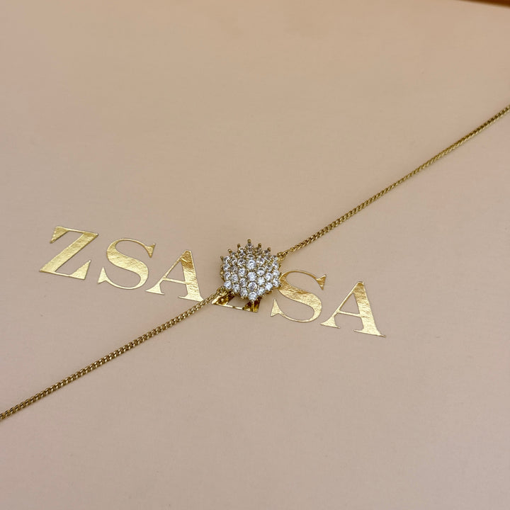 Zircone flower gold plated pendant & bracelet