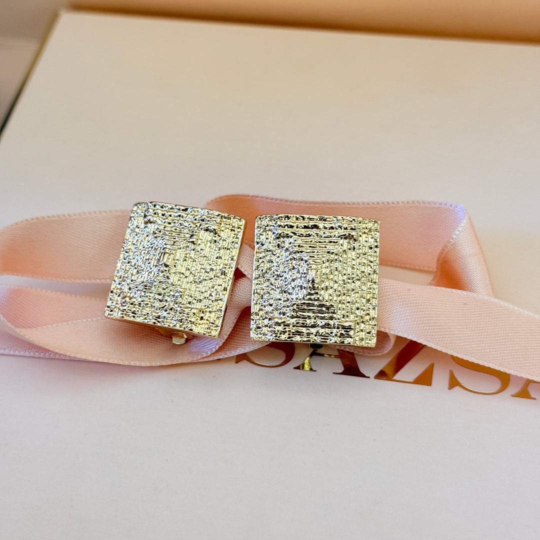 Plain chunky texture squeaker gold plated clip on earrings