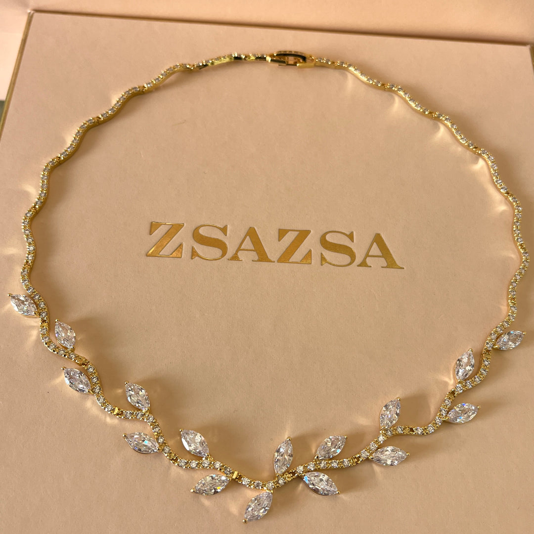 Gold marquise zircone set