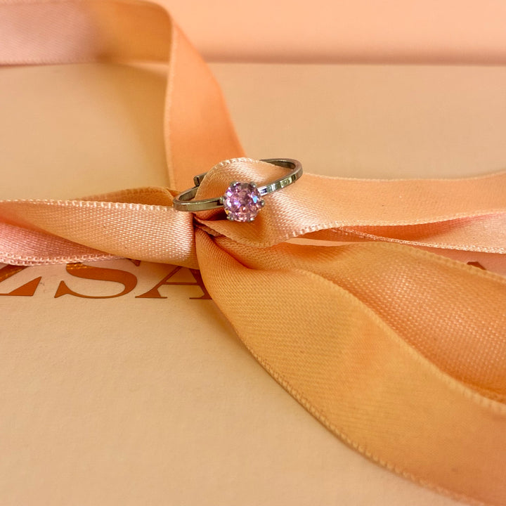 Solitaire light pink stainless steel ring