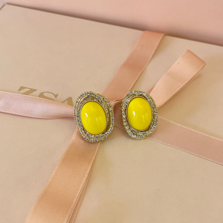 Yellow studs with Swarovski crystals