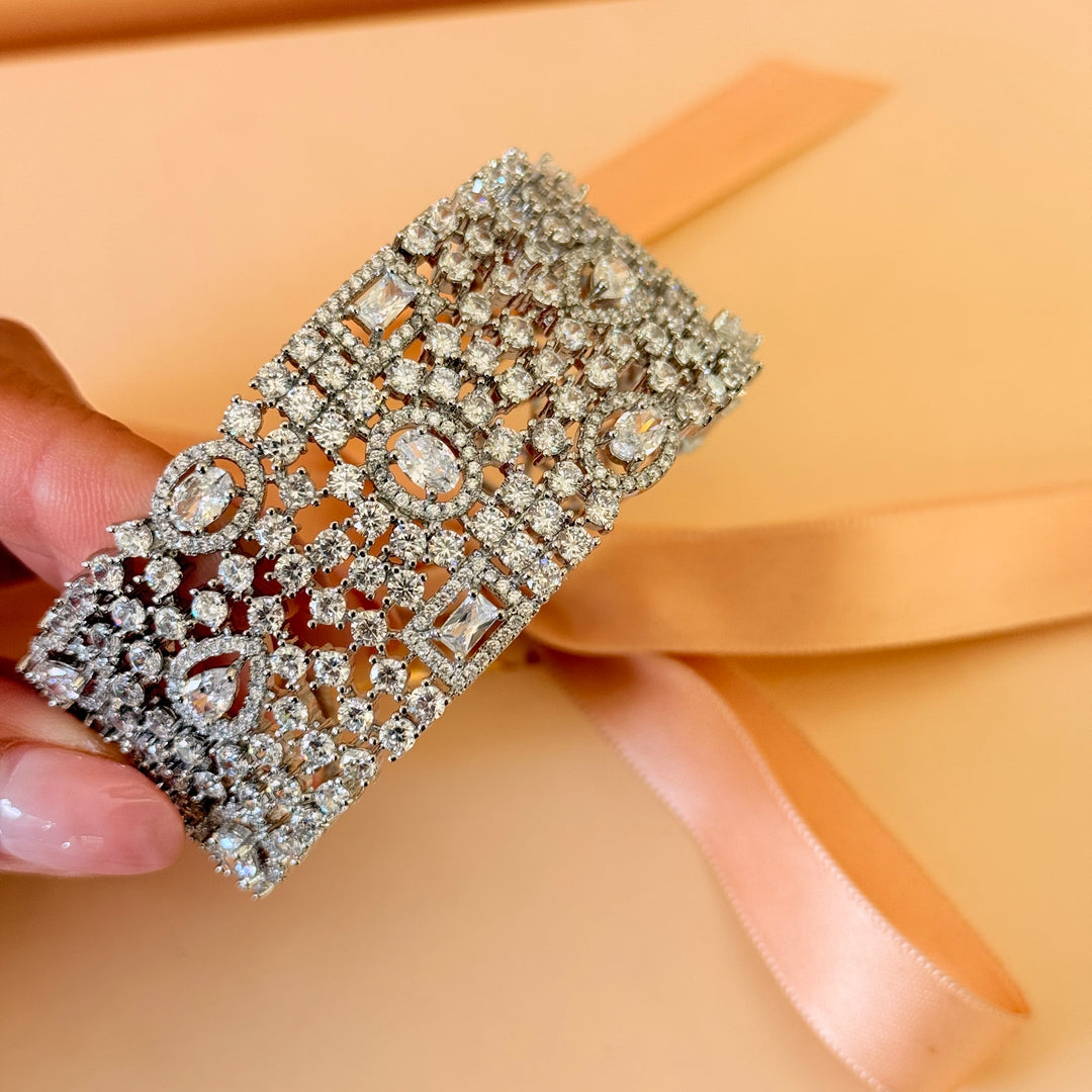 Mixed shapes zircone silver bangle