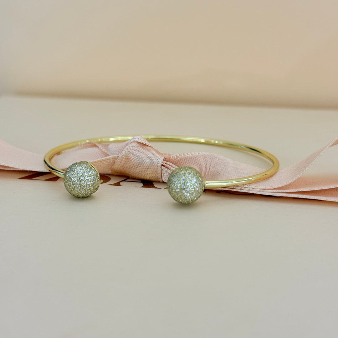 Zircone half ball gold plated bangle
