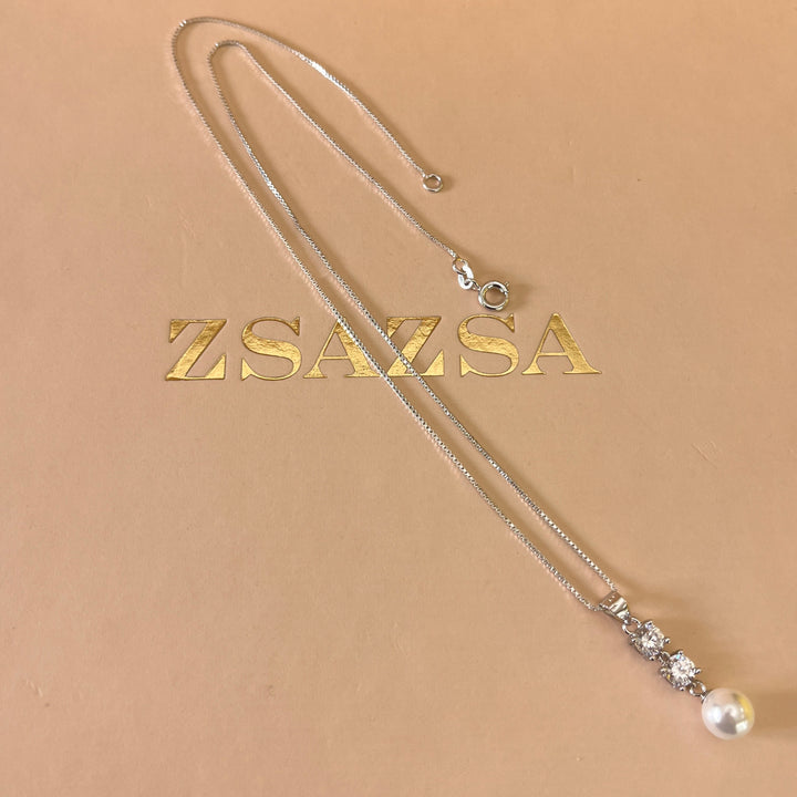 Zircone and white pearls sterling silver set