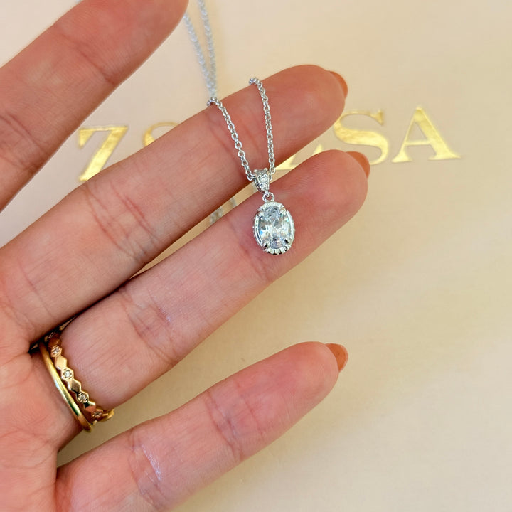 Dainty oval zircone silver pendant