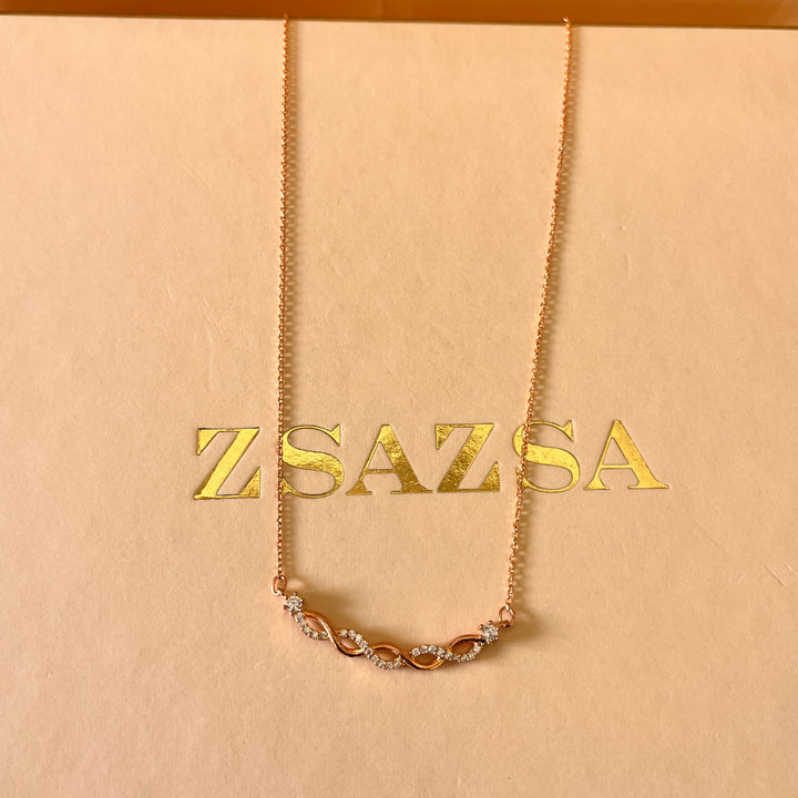 zircone rose gold plated twisted pendant