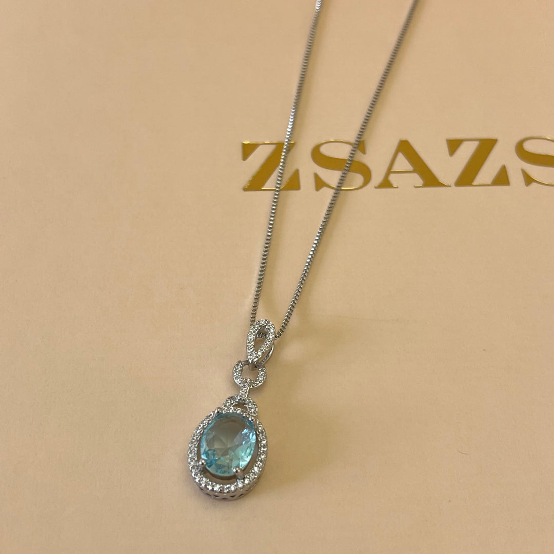 Turquoise oval zircone set