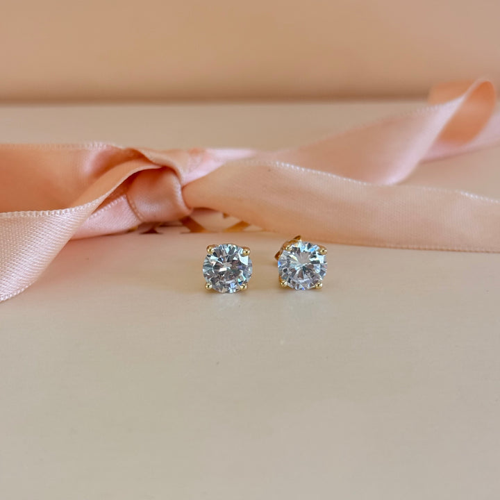 Medium size zircone solitaire gold plated earrings