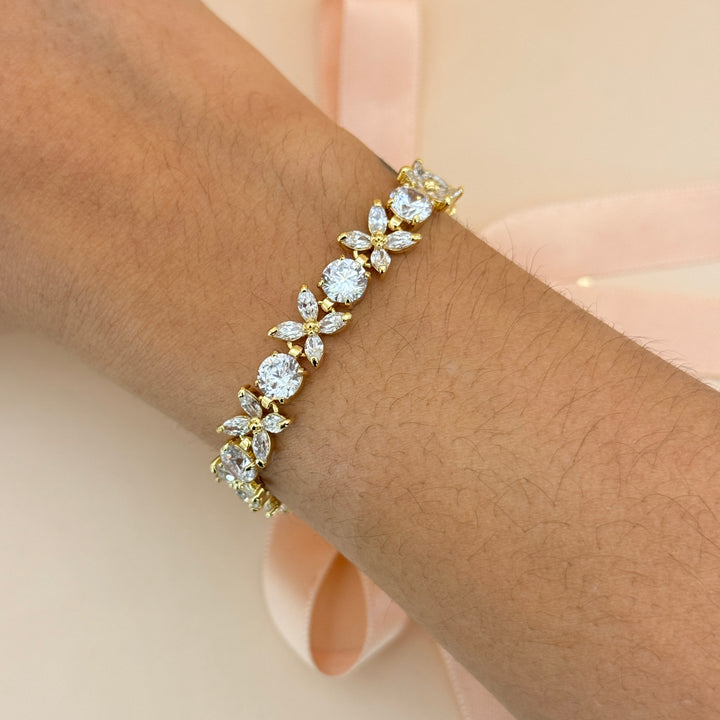 Round and marquise zircone gold plated earrings and bracelet