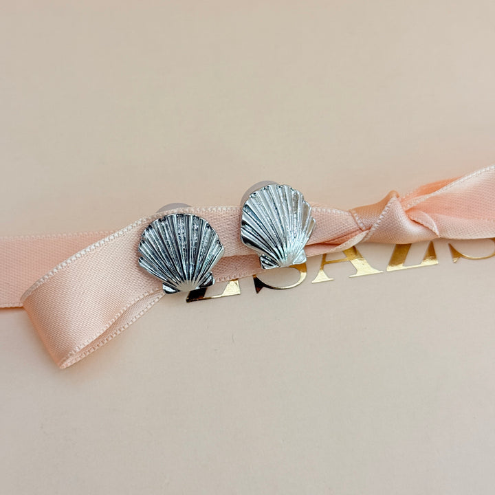 Plain shell silver clip on earrings