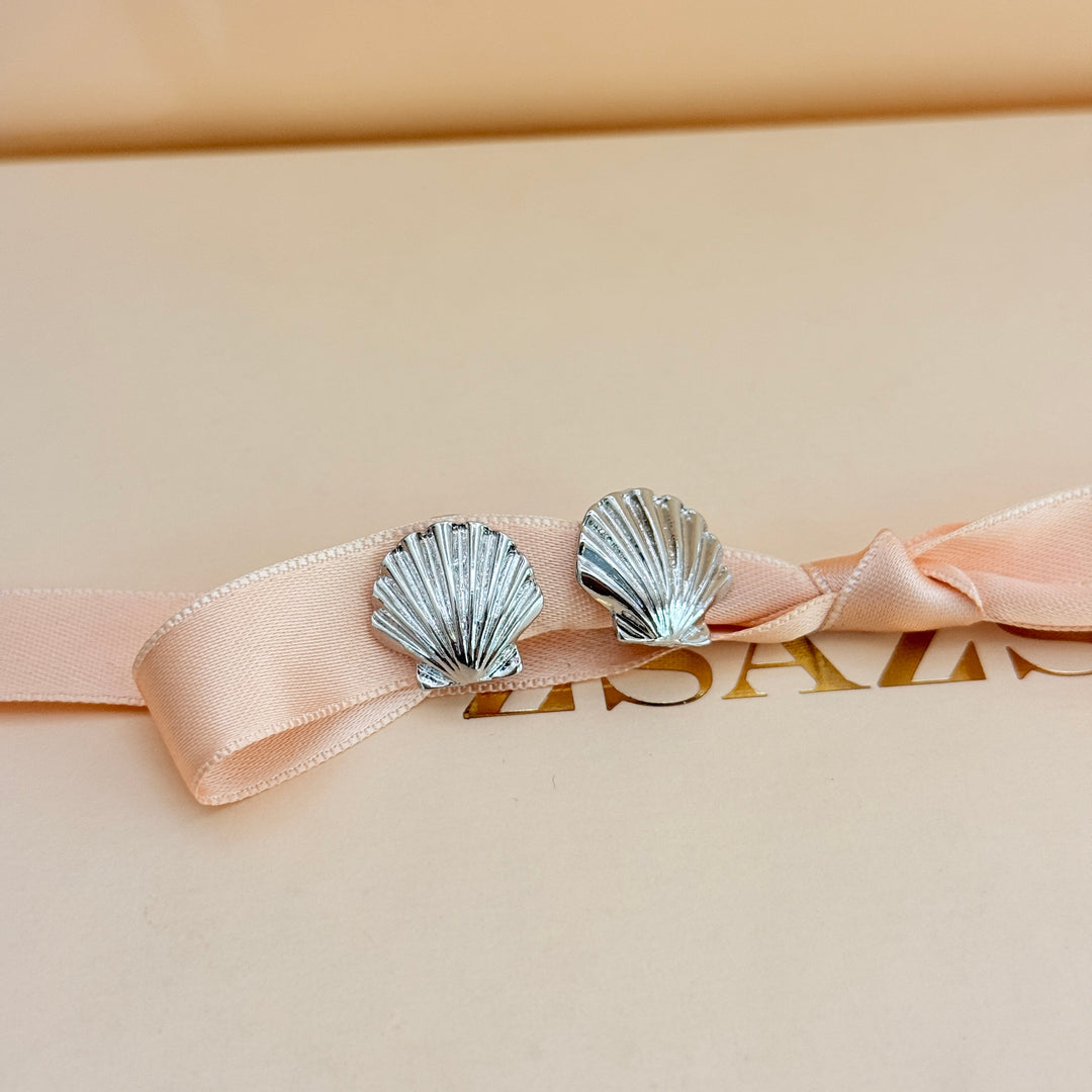Plain shell silver clip on earrings