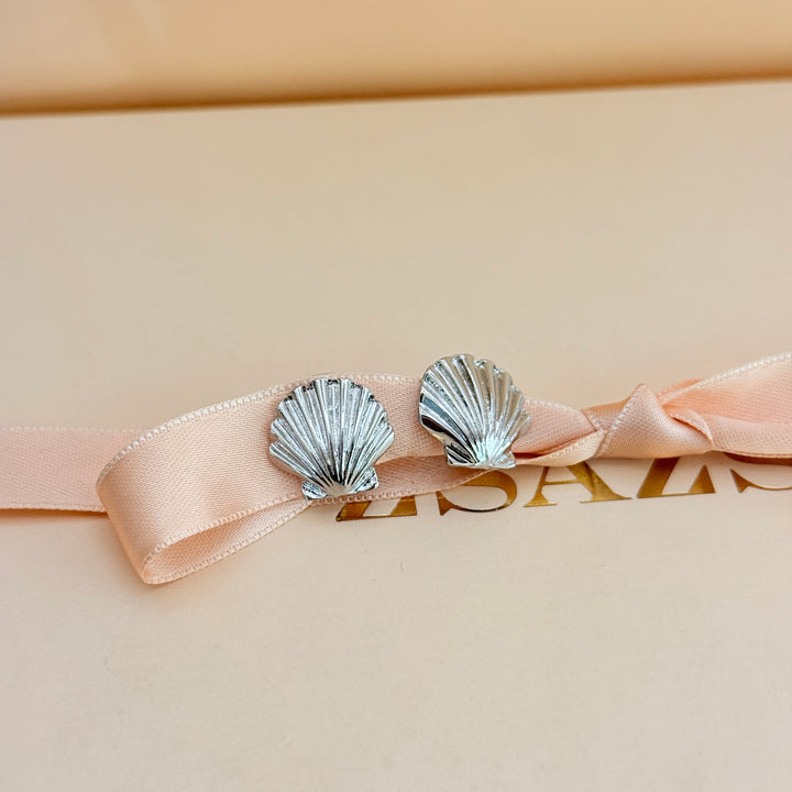 Plain shell silver clip on earrings