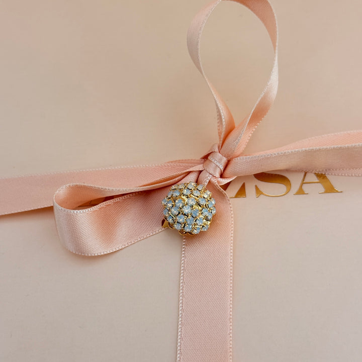 White preciosa crystals gold plated brooch