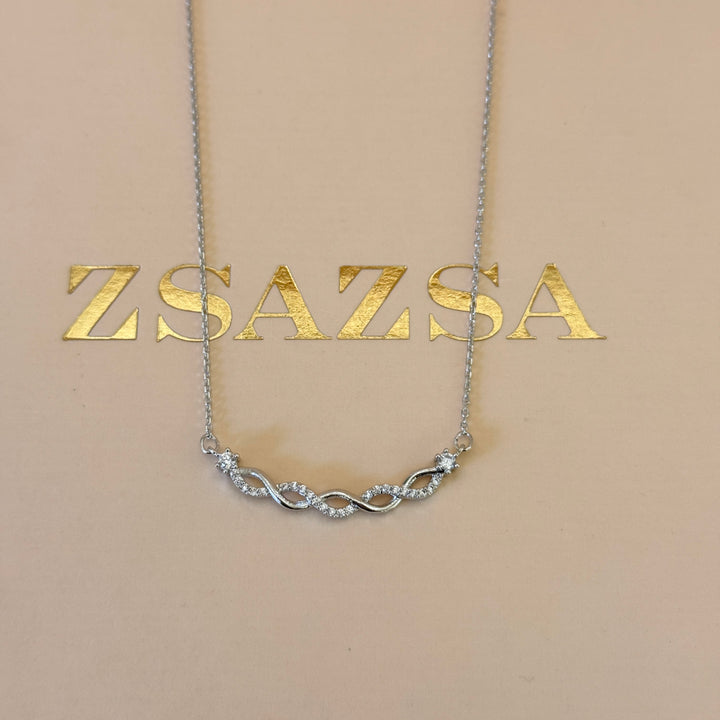 Dainty zircone silver pendant