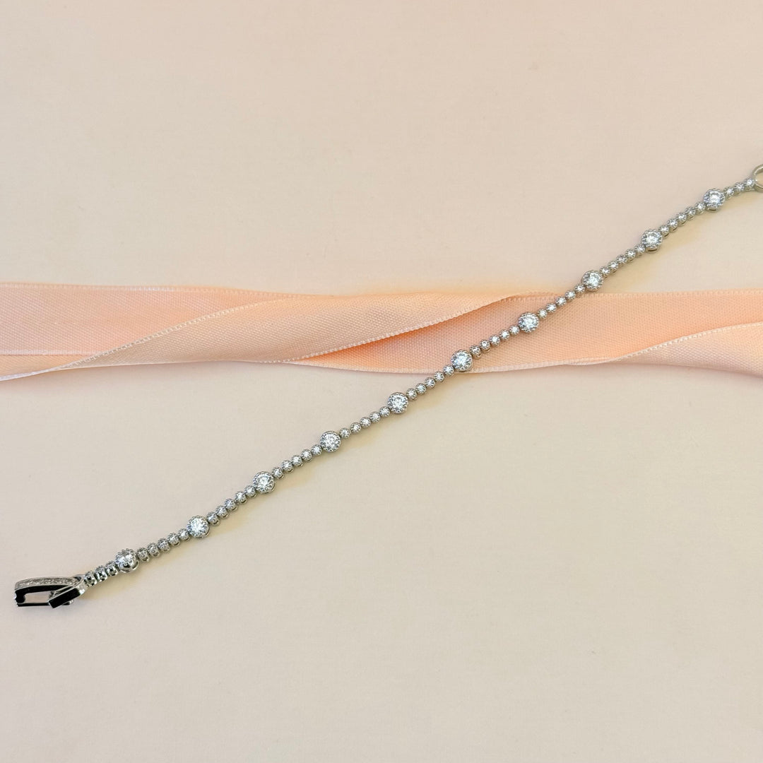 Dainty teardrop zircone silver earrings and bracelet