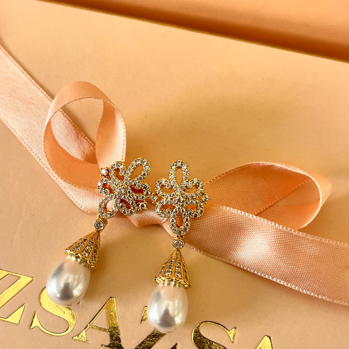 Zircone and pearls gold plated earrings