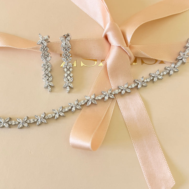 Flower and round zircone silver earrings and bracelet