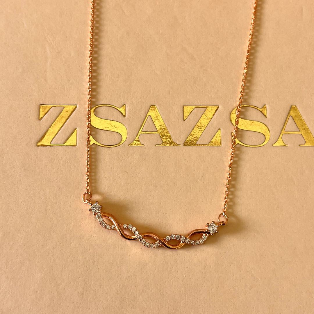 zircone rose gold plated twisted pendant