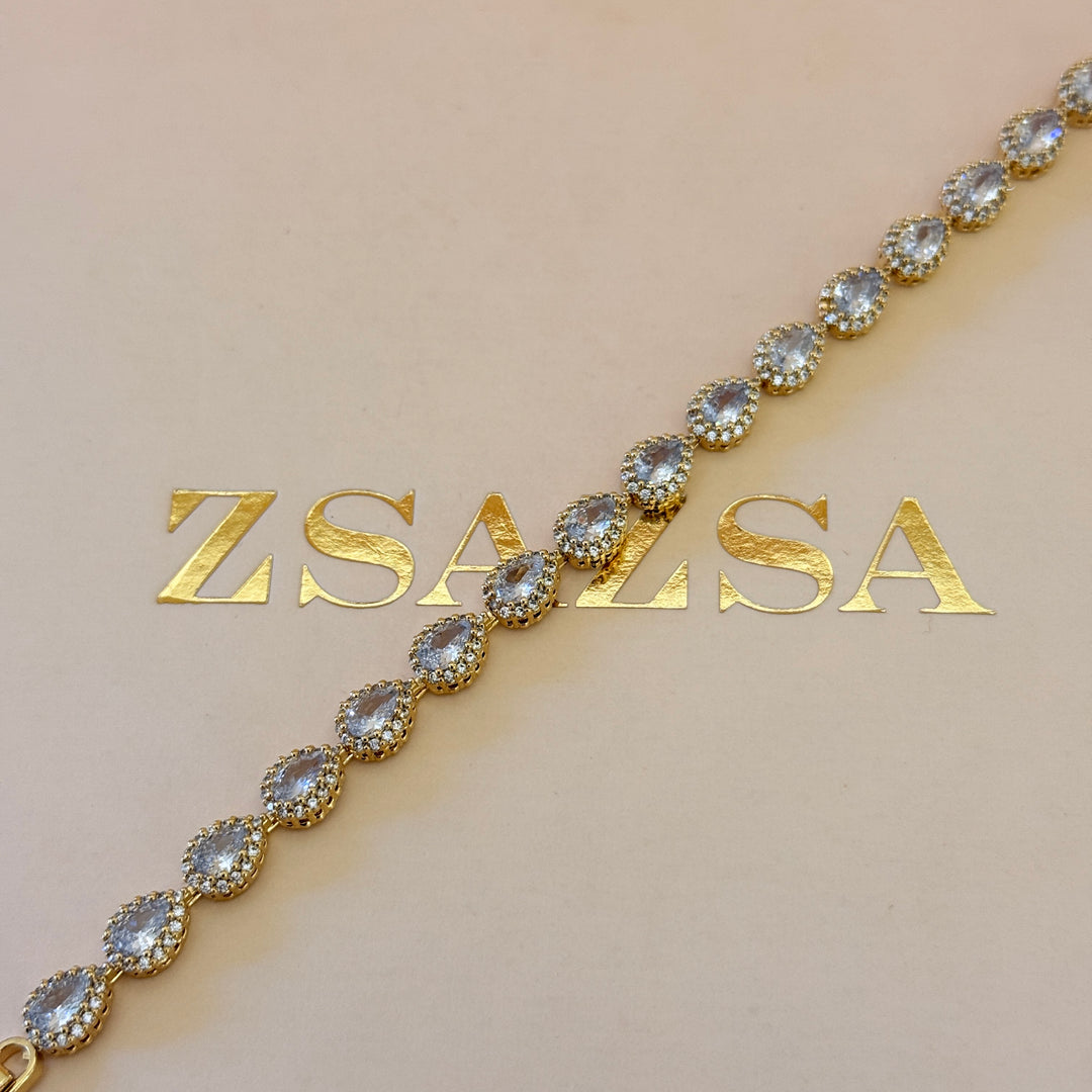 Teardrop zircone gold plated earrings and bracelet