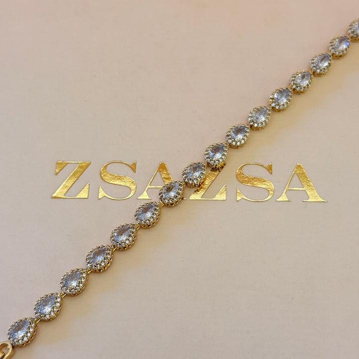 Teardrop zircone gold plated earrings and bracelet