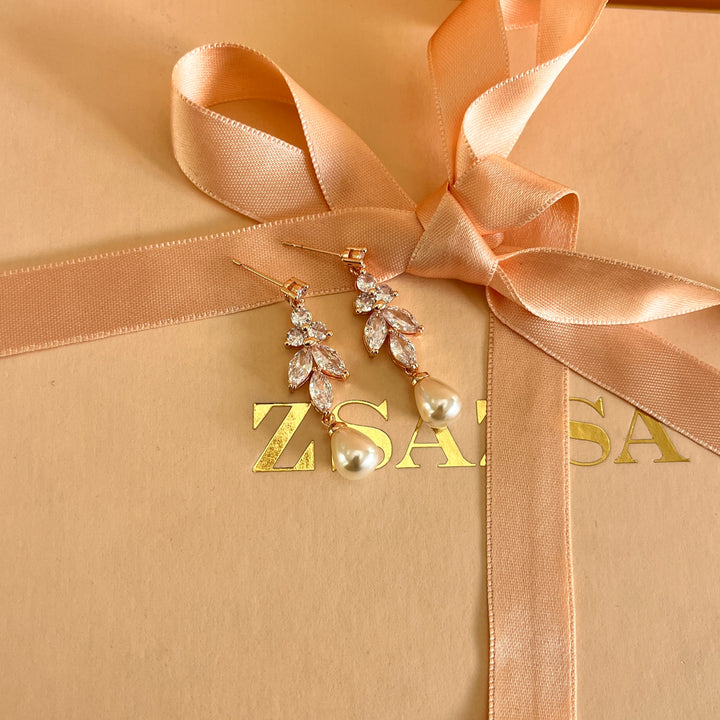 Zircone and pearl rose gold plated earrings