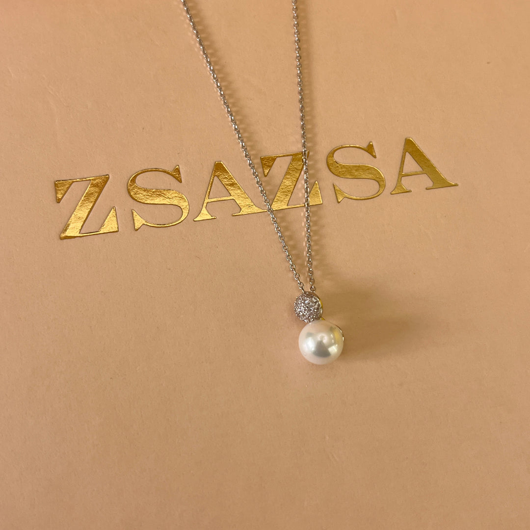 Zircone and white pearls white gold plated set