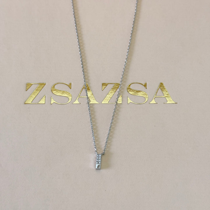 Dainty zircons silver pendant