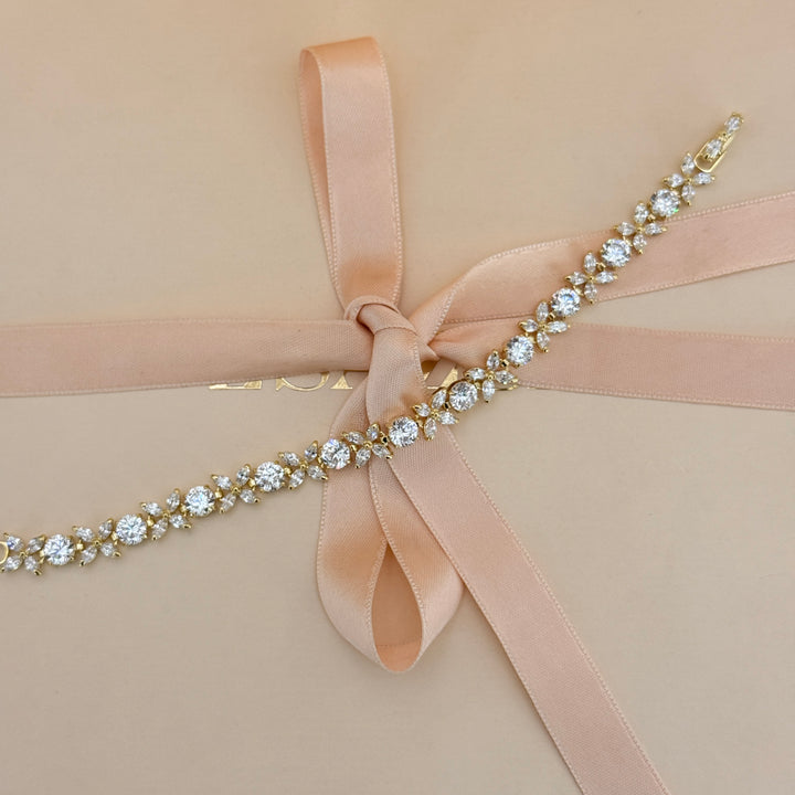 Round and marquise zircone gold plated earrings and bracelet