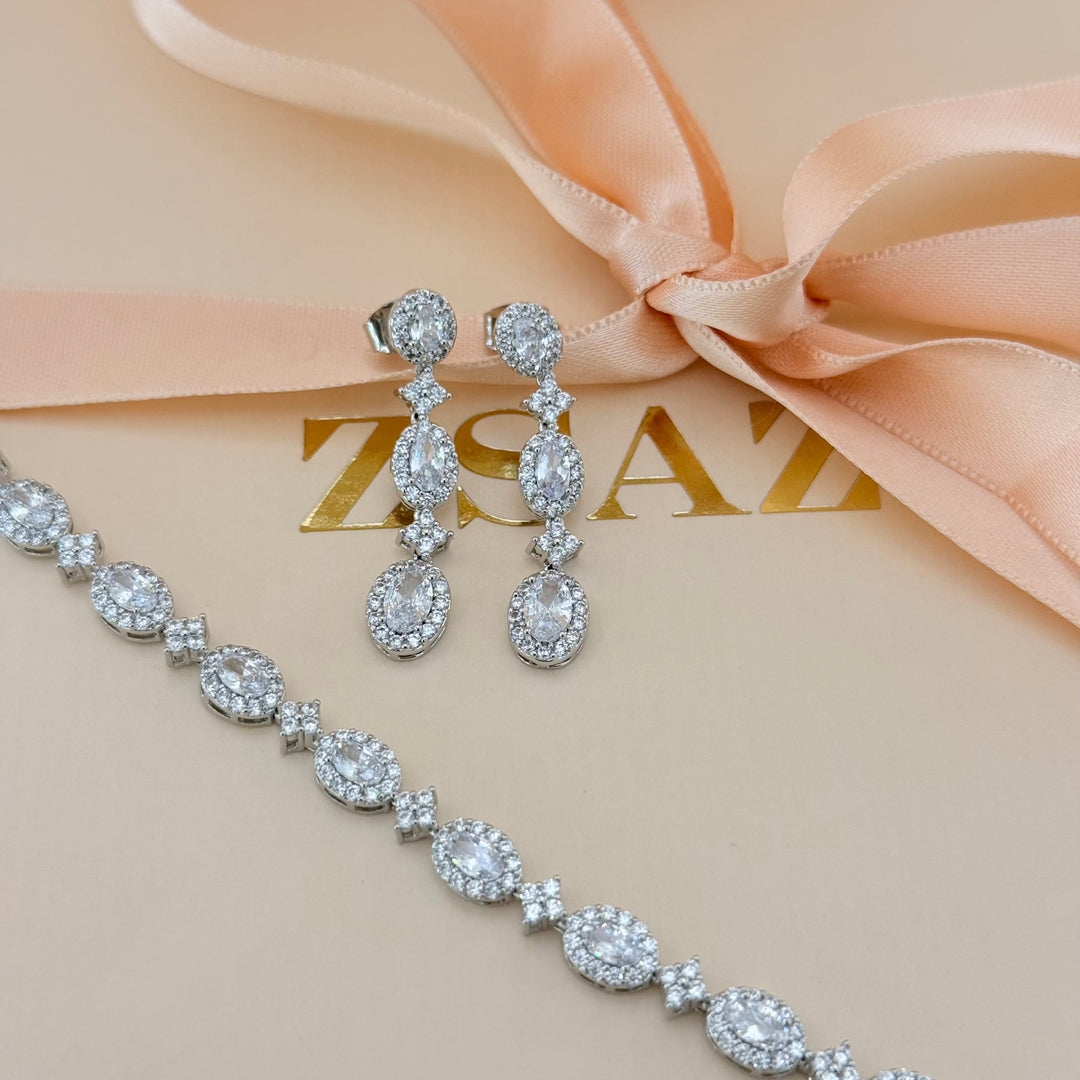 Oval zircone silver earrings and bracelet