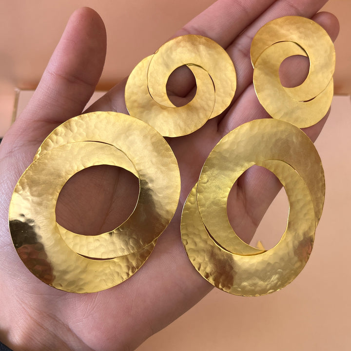 Big & twisted gold handmade earrings