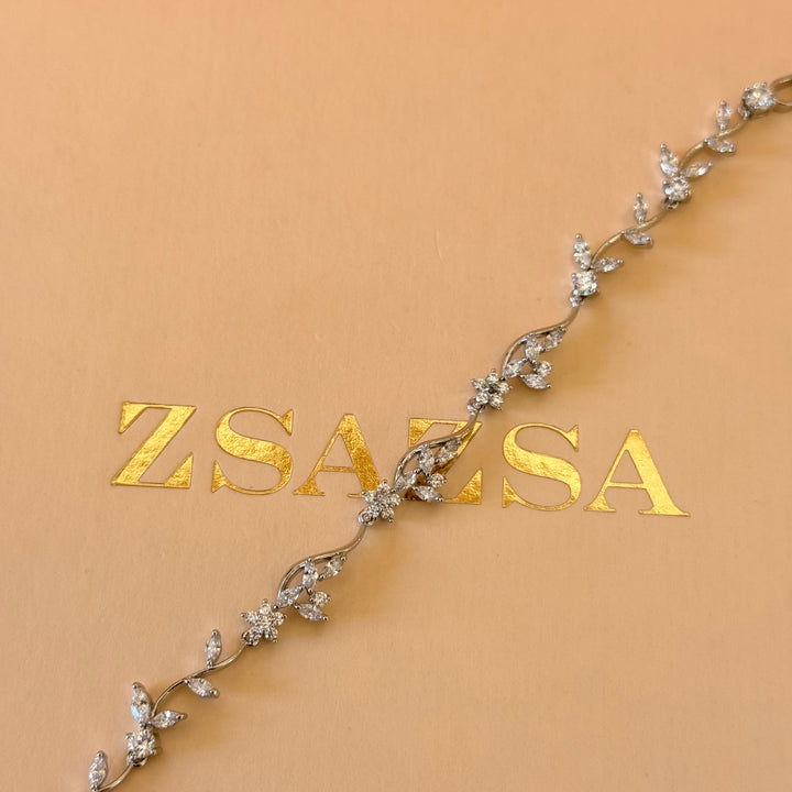 Teardrop and flower zircone silver earrings and bracelet