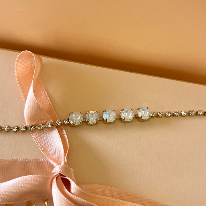 Five white Swarovski crystals bracelet