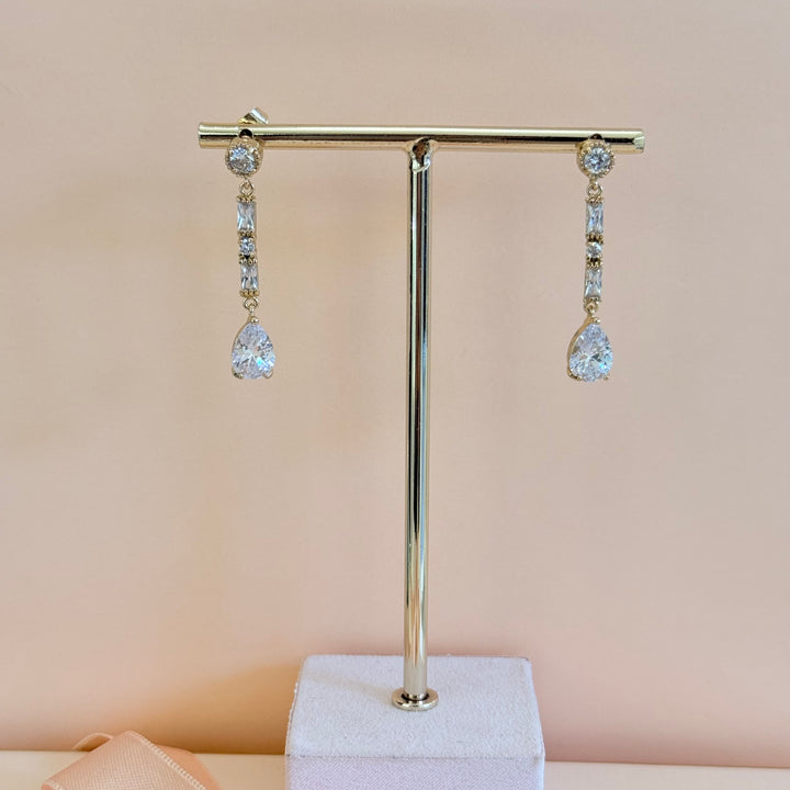Baguette and teardrop zircone gold plated earrings