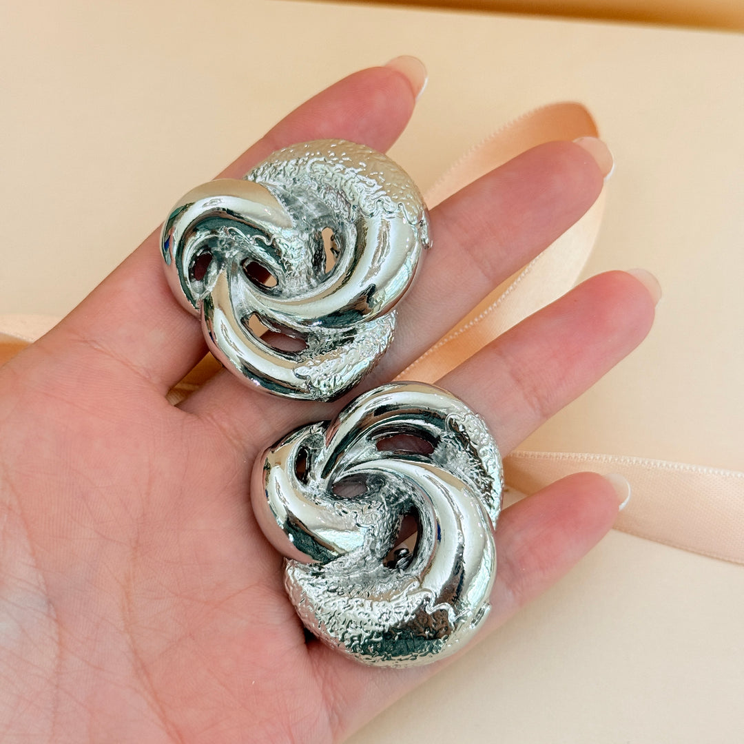 Plain chunky twisted silver clip on earrings
