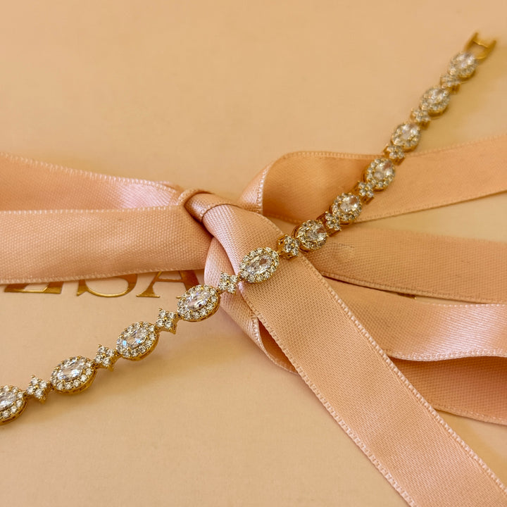 Oval zircone gold plated earrings and bracelet set