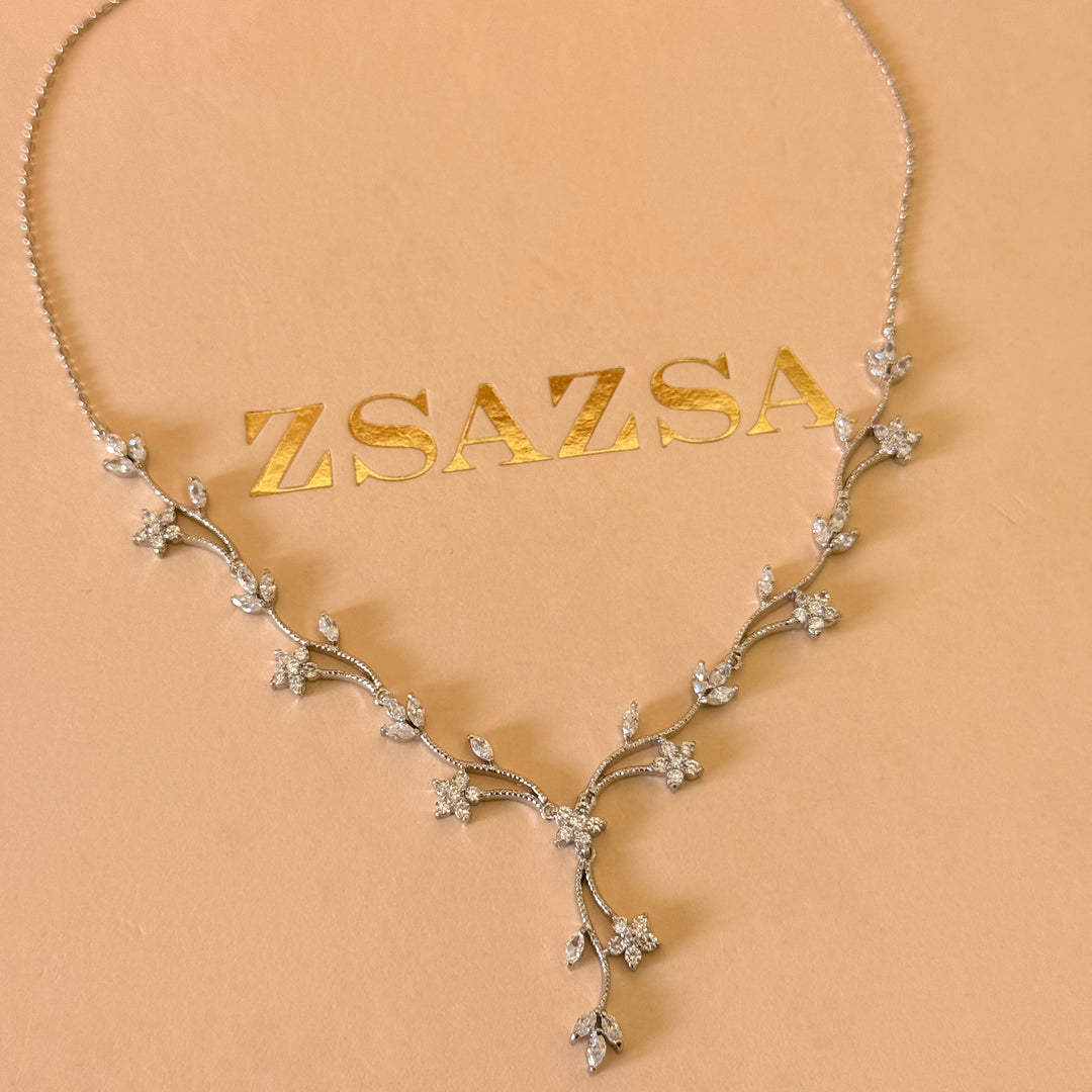 Flower and leaves zircone silver set