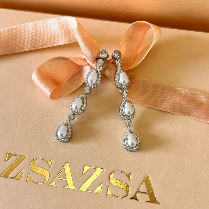 Zircone and white pearls white gold plated teardrop set