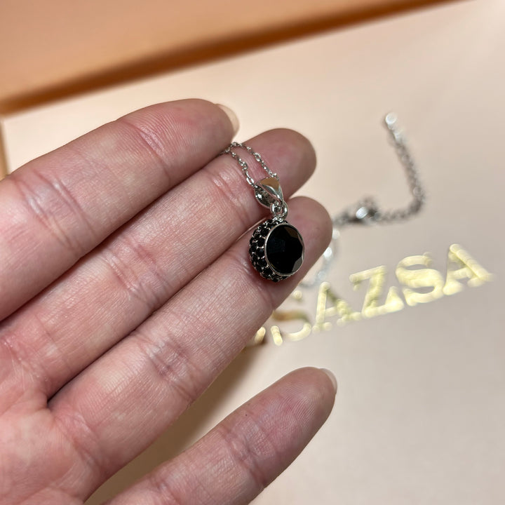 Dainty black silver pendant