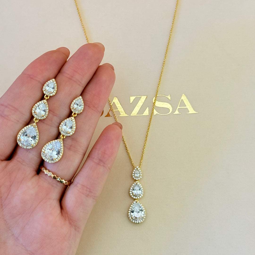 Triple teardrop zircone gold player pendant set