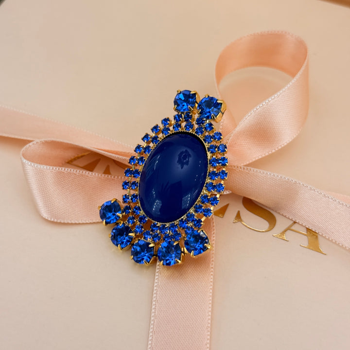 Royal blue preciosa crystals gold plated brooch